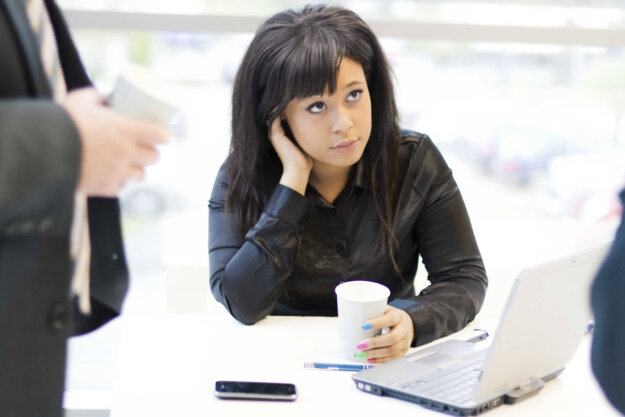iStock_000032933400_Full a lady listening to a team speaker