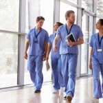 medical staff walking in the hallway